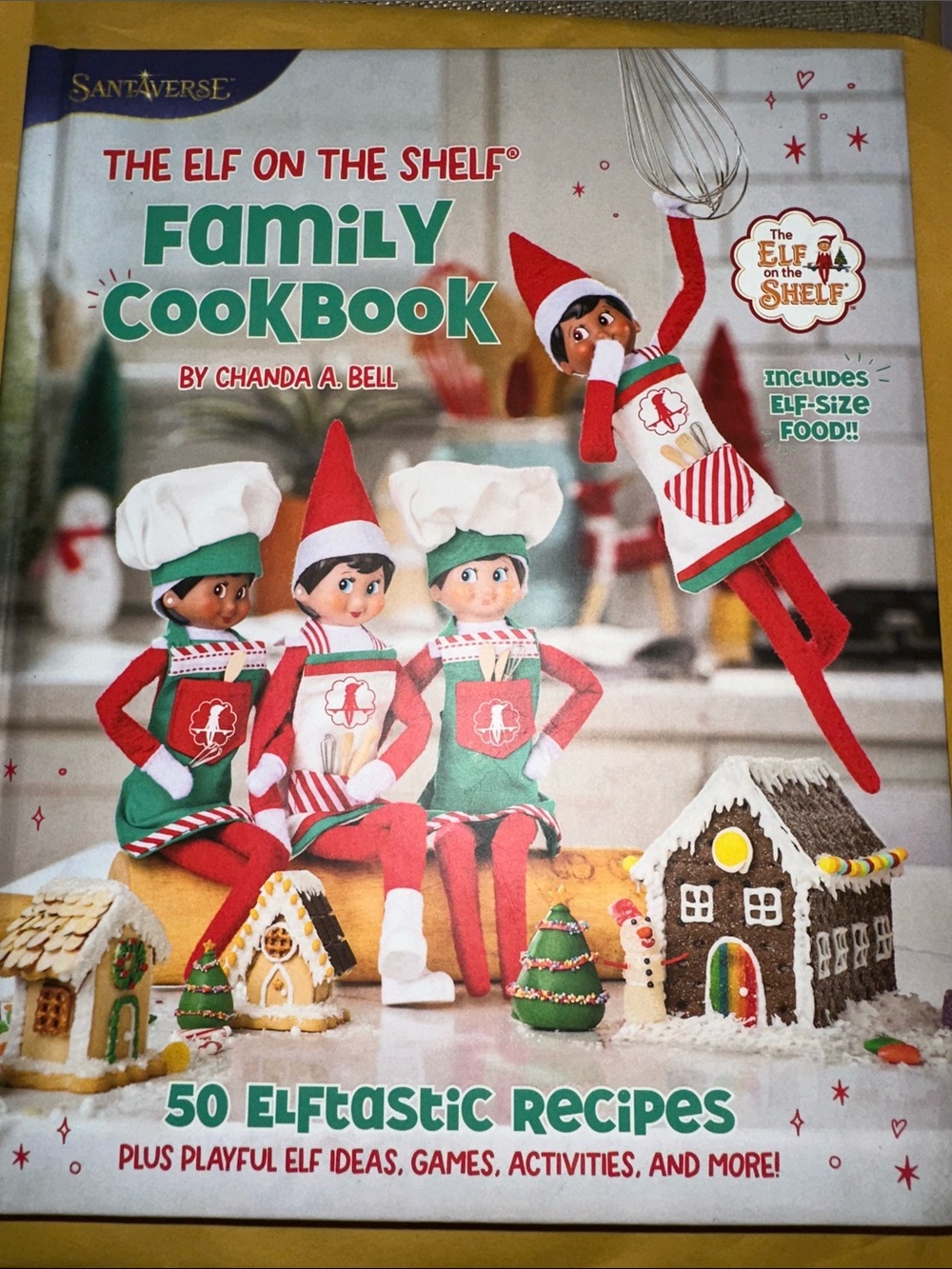 Santa verse the elf on the shelf family cookbook